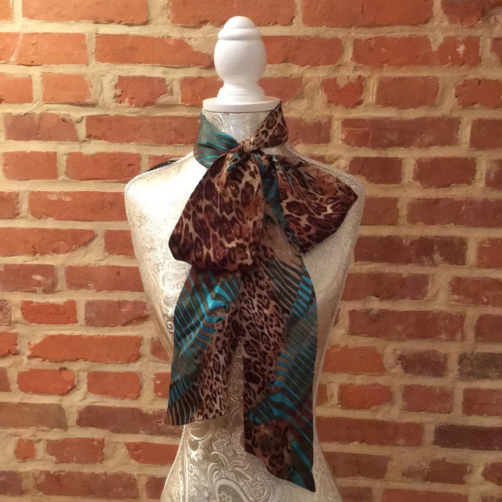 Bebe versatile satin leaped scarf.